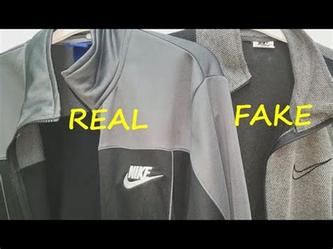 fake vs real nike windbreaker|real vs fake nike tech.